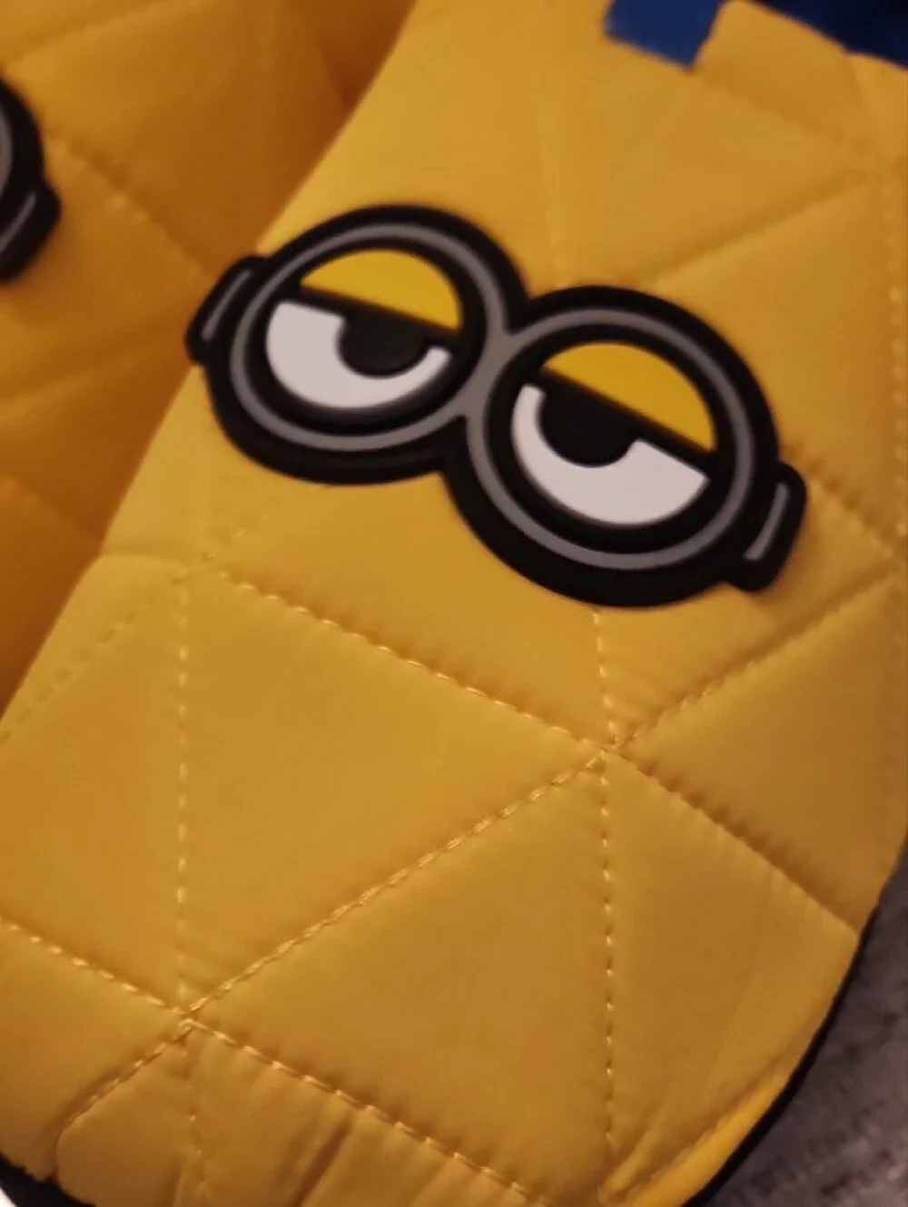 Yellow Quilted Slip-On Loafers with Character Accent